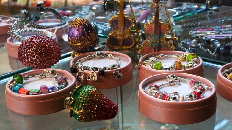 A display of jewelry in a glass case.