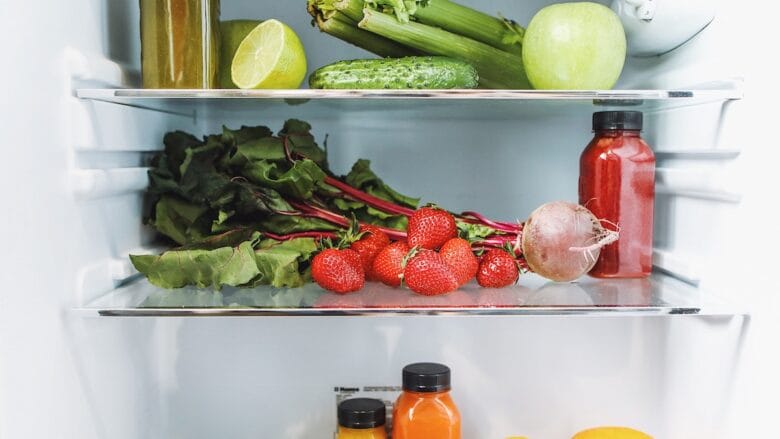 A refrigerator full of fruits and vegetables.